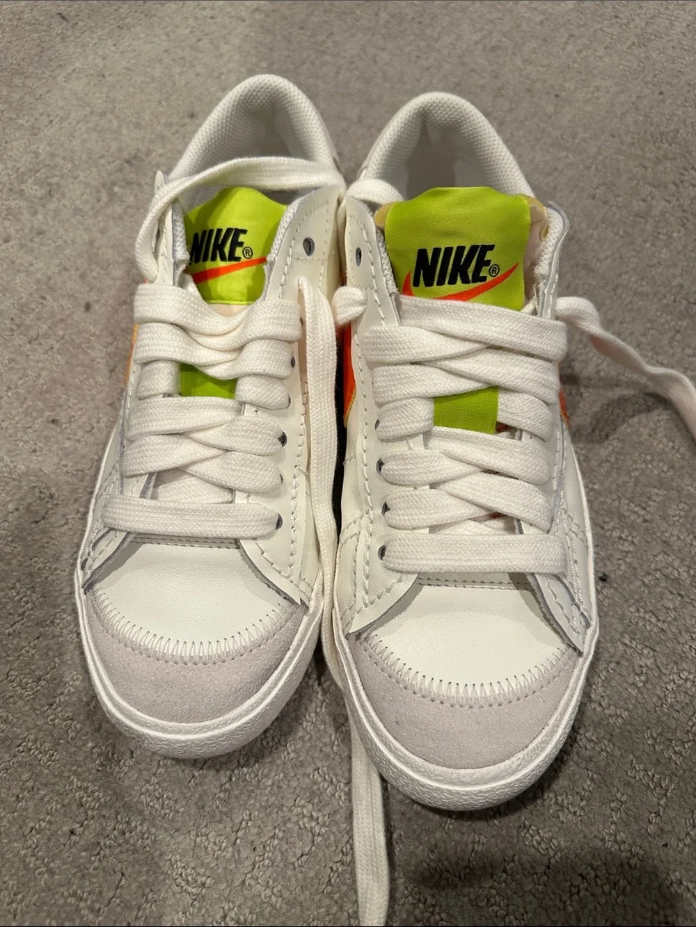 Nike White Sneakers with Neon Green Tongue and Orange Swoosh